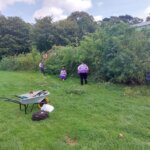 Picture of volunteers helping to maintain shrubs in Bute park