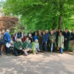 group photo of IDS and Cardiff Parks staff in Bute Park with trees in the background